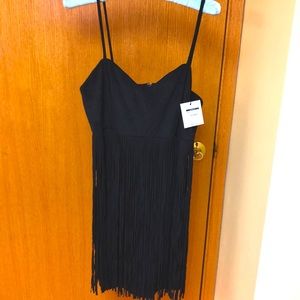 Black suede fringe dress . New with tags